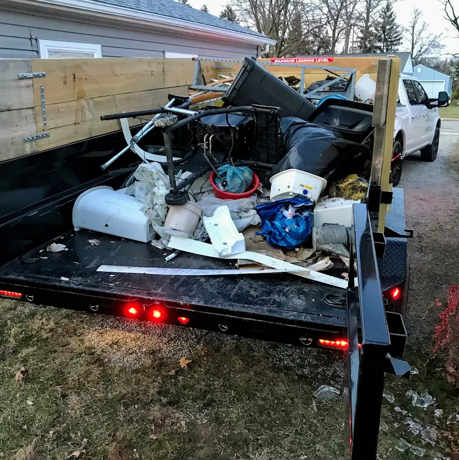 Roll-off dumpster delivered to a residential driveway in Gardere