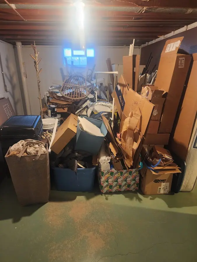 Roll-off dumpster container at job site for 15 Yard Dumpster Rental in Gardere